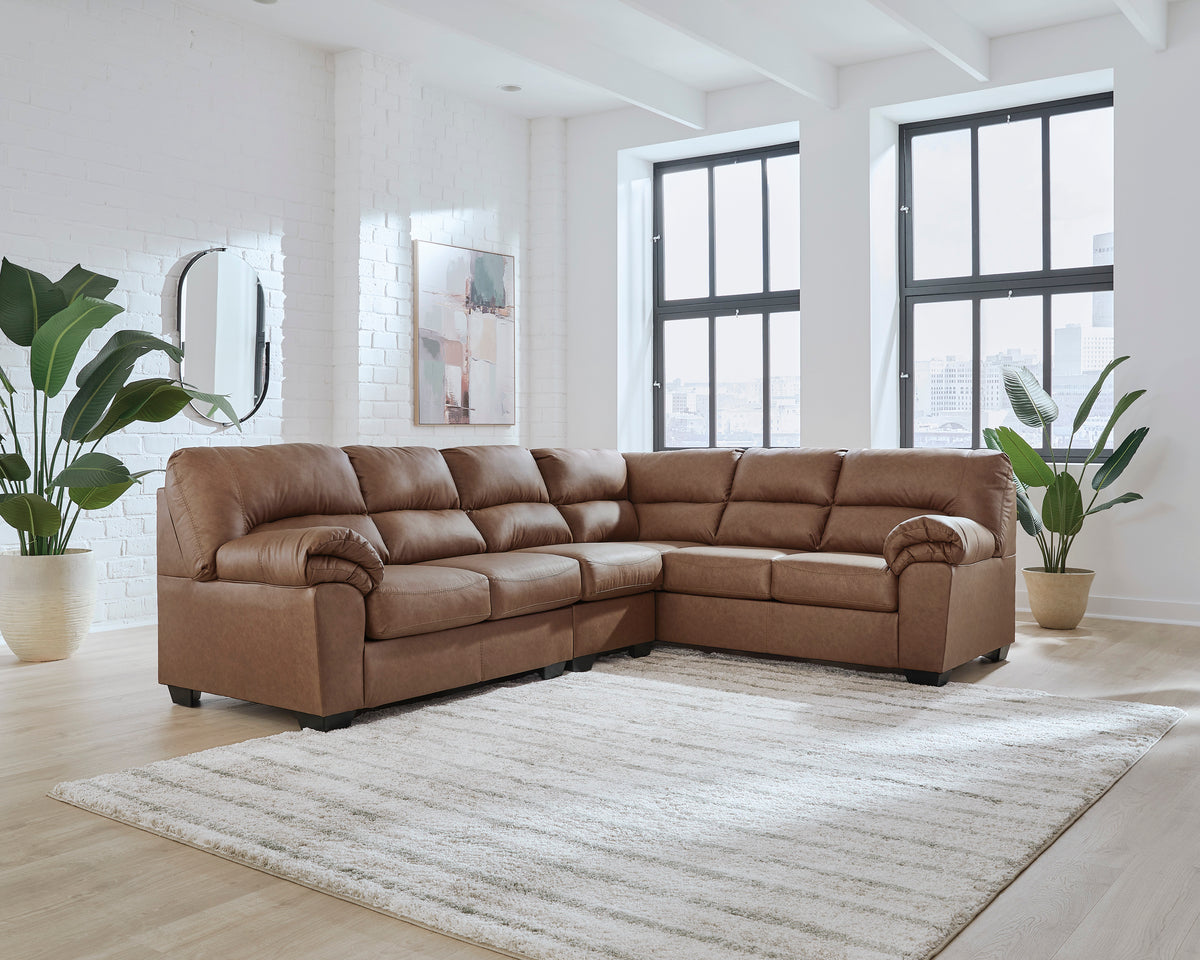 Brown 3-piece right-facing sectional sofa with padded cushions and rolled arms