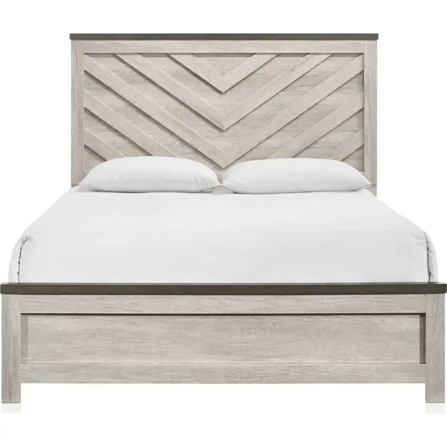 Queen bed with light gray wood frame, paneled chevron headboard, white mattress and pillows