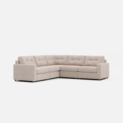 Light stone L-shaped sectional sofa with tufted back and padded arms