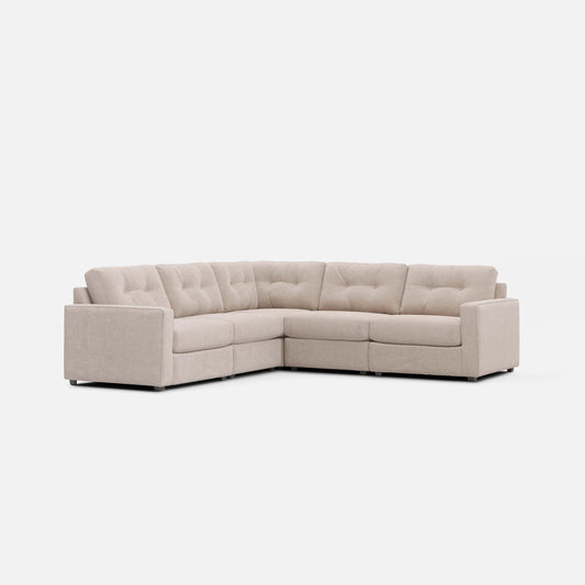 Light stone L-shaped sectional sofa with tufted back and padded arms