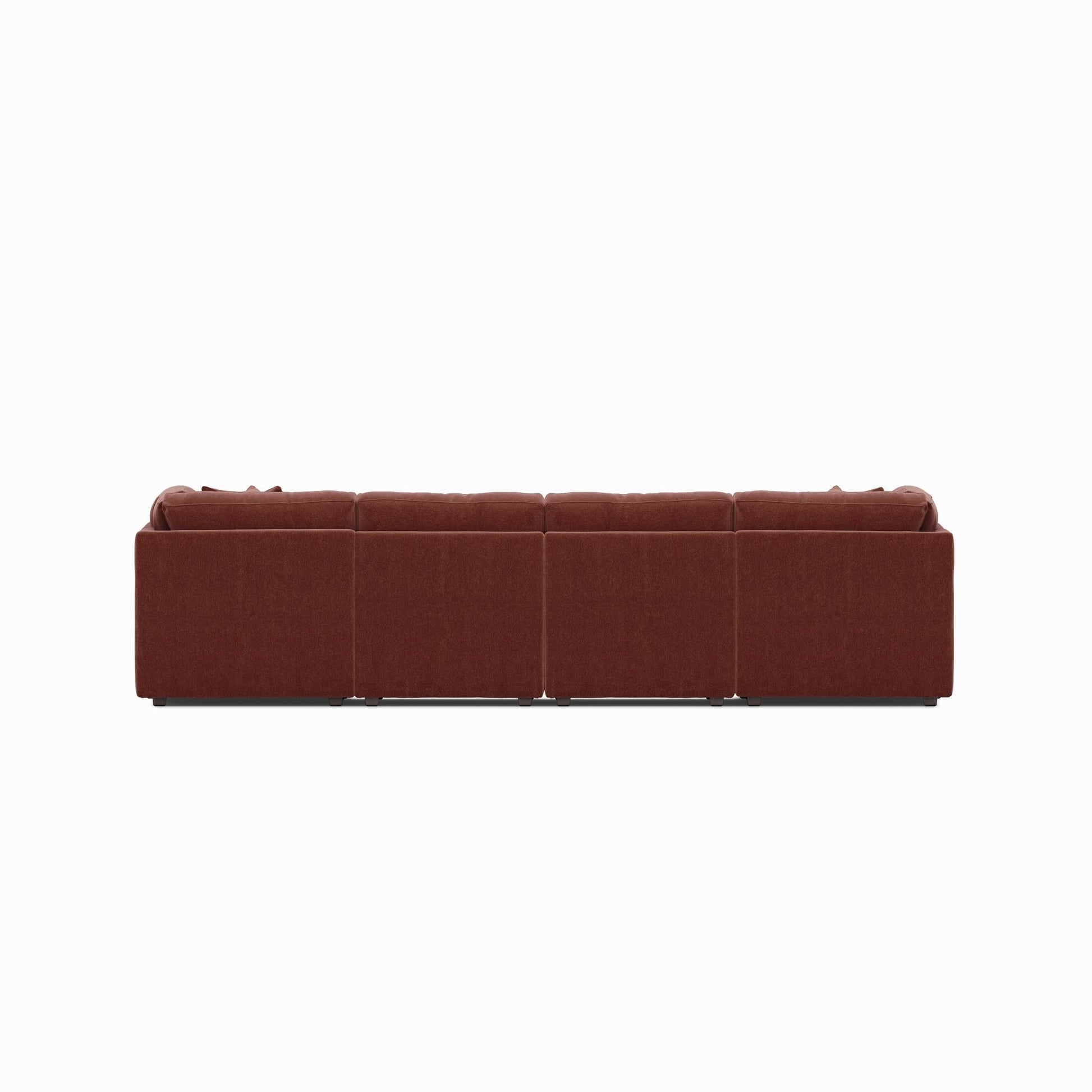 Dark red modular sectional sofa with padded seats, tufted cushions, straight back