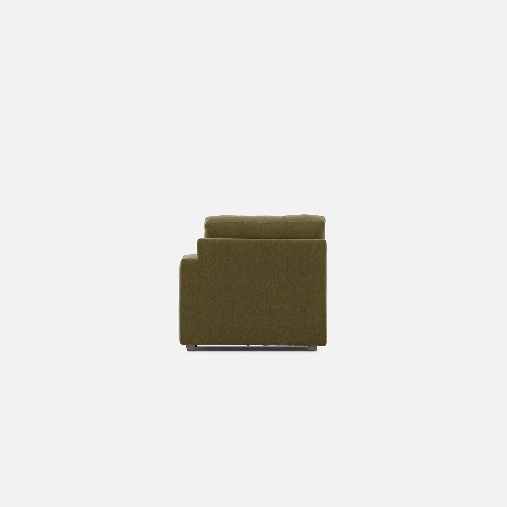 Olive modular lounge chair back view with padded backrest and squared seat