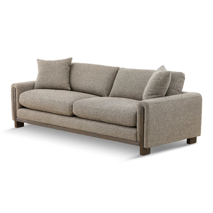 Gray fabric sofa with track arms, three back cushions, and dark wood legs.