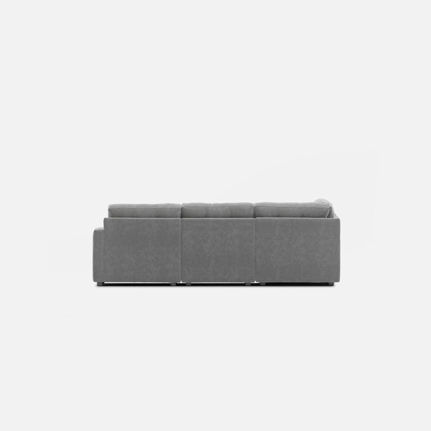 Gray modular sectional sofa with chaise end, square arms, and tufted back panels