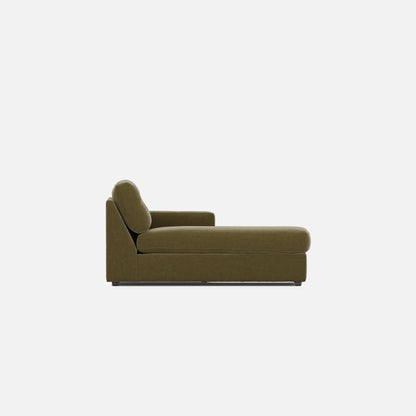 Olive chaise lounge with rounded back cushion and low upholstered base
