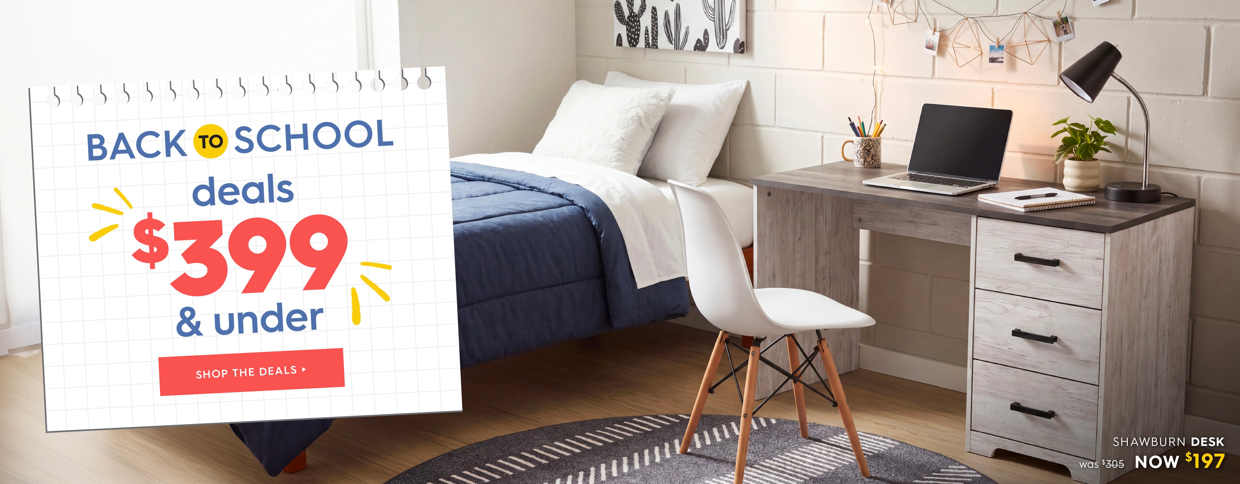 A promotional banner for Back to School deals showing a bedroom setup with a bed, desk, chair, and laptop, alongside a large text overlay that reads 'BACK TO SCHOOL deals $399 & under'. Shop the deals.