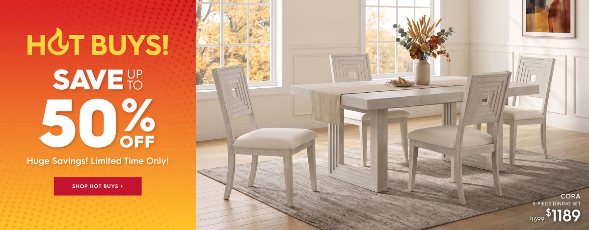 A 5-piece dining room set featuring a rectangular white table and four matching white chairs with light beige cushions, styled in a bright, modern dining room. The left side of the image features a prominent orange and yellow promotional banner with text reading 'HOT BUYS! SAVE UP TO 50% OFF'.