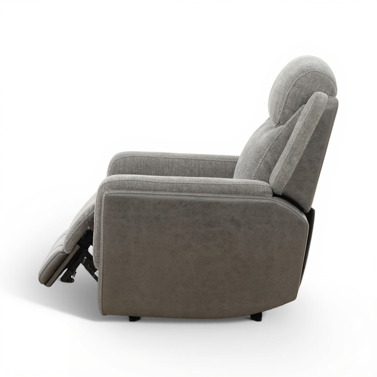 Grey power recliner with open mechanism on the side, showing footrest lifted outward.