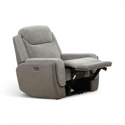 Grey power recliner chair with padded arms and extended footrest