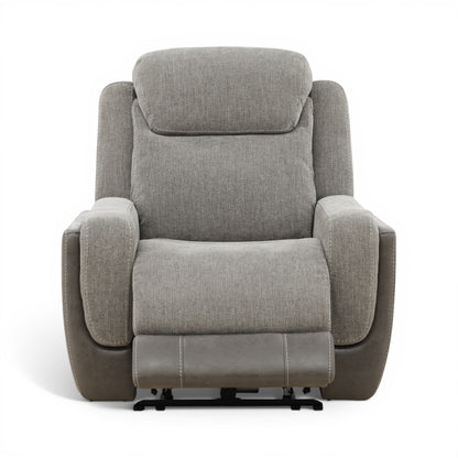 Grey power recliner front view with thick cushions and visible power-foot mechanism rails.