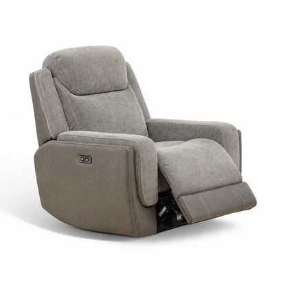 Grey power recliner in reclined angle, with side control panel and extended footrest.