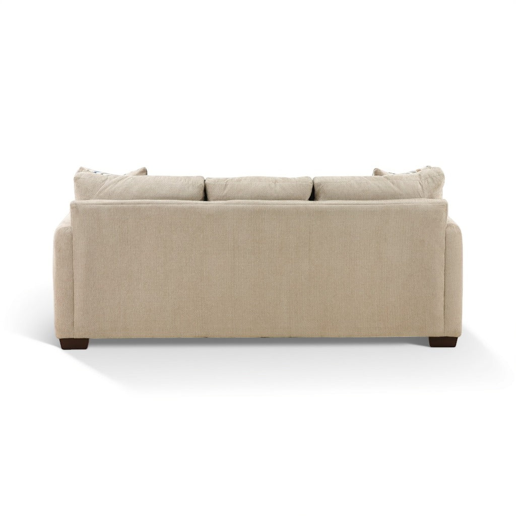 Parchment sofa chaise with upholstered arms and back cushions; no visible side pillows.