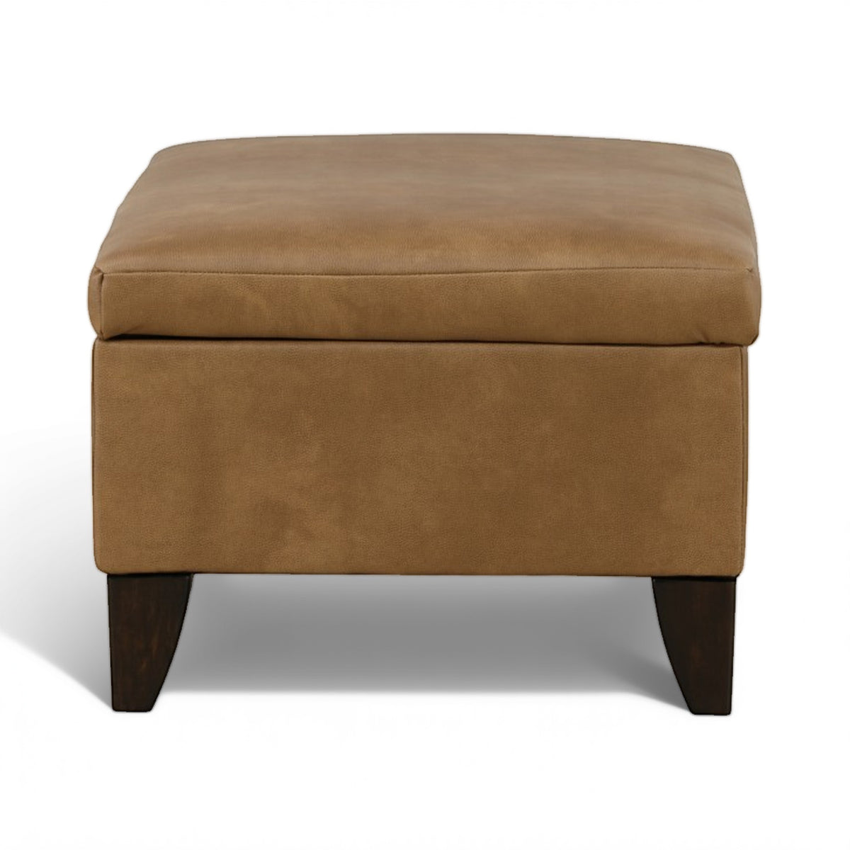 Tan storage ottoman with padded seat and hinged lid, dark wooden legs