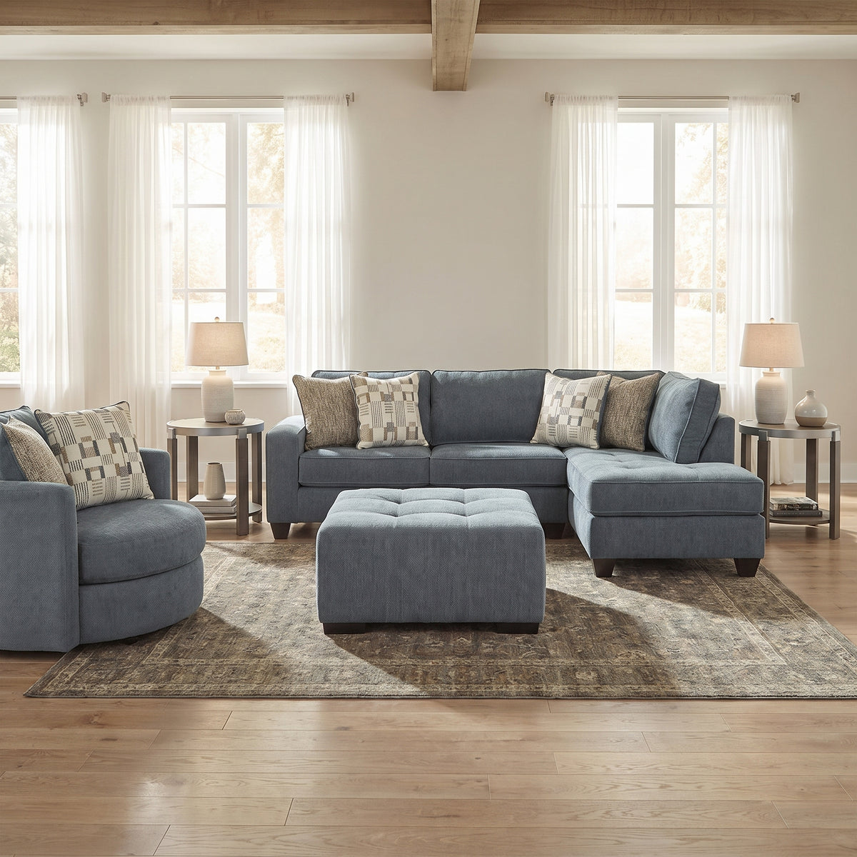 Dark gray sectional sofa with chaise and central ottoman