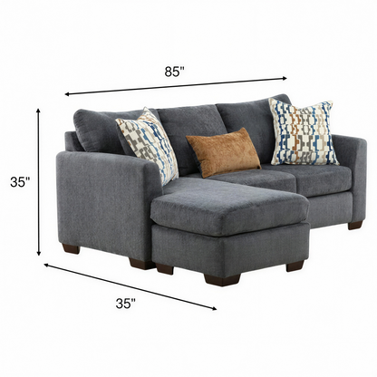 Charcoal sofa chaise with chaise ottoman and patterned throw pillows, plus accent cushion.