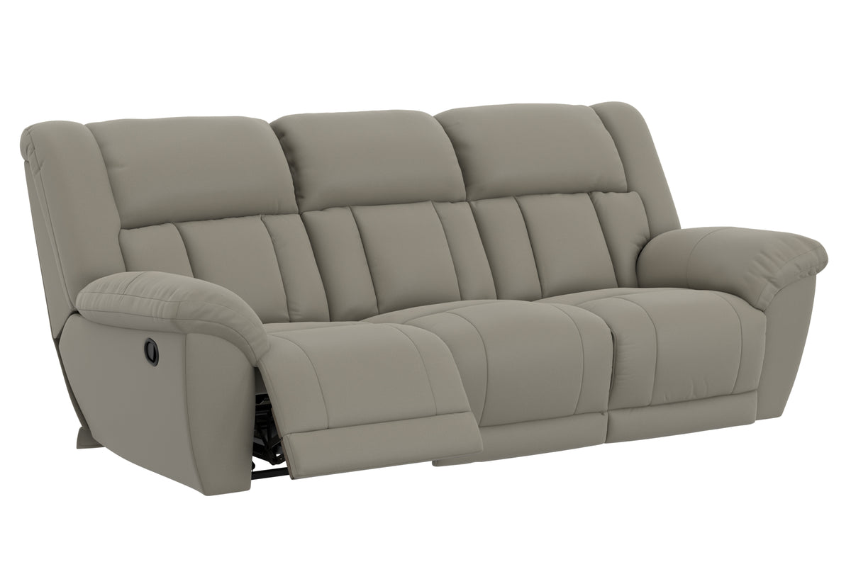 Light taupe reclining sofa angled view with cushioned back and side panel arms.