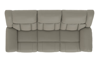 Light taupe reclining sofa back view with tufted, segmented back cushions.