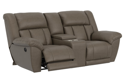 Taupe reclining loveseat, side view with padded arms and extended footrest tray