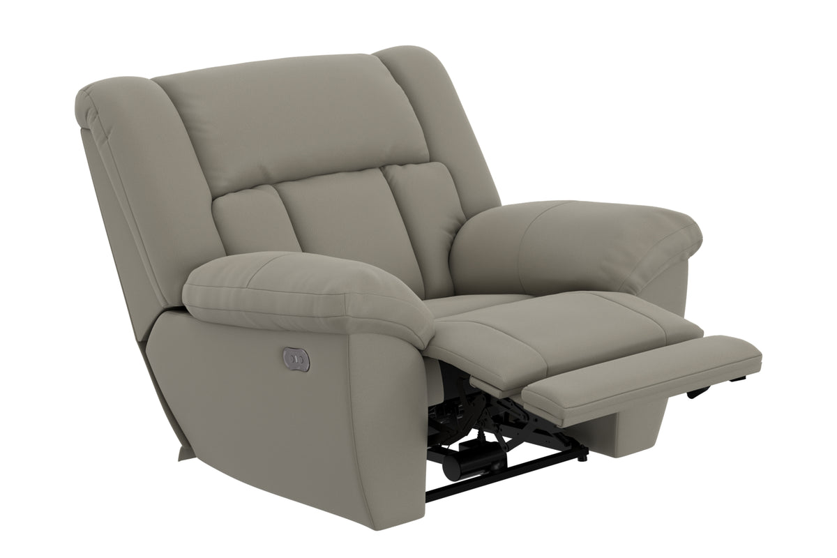 Taupe power recliner chair with open footrest and padded armrests from an angle.