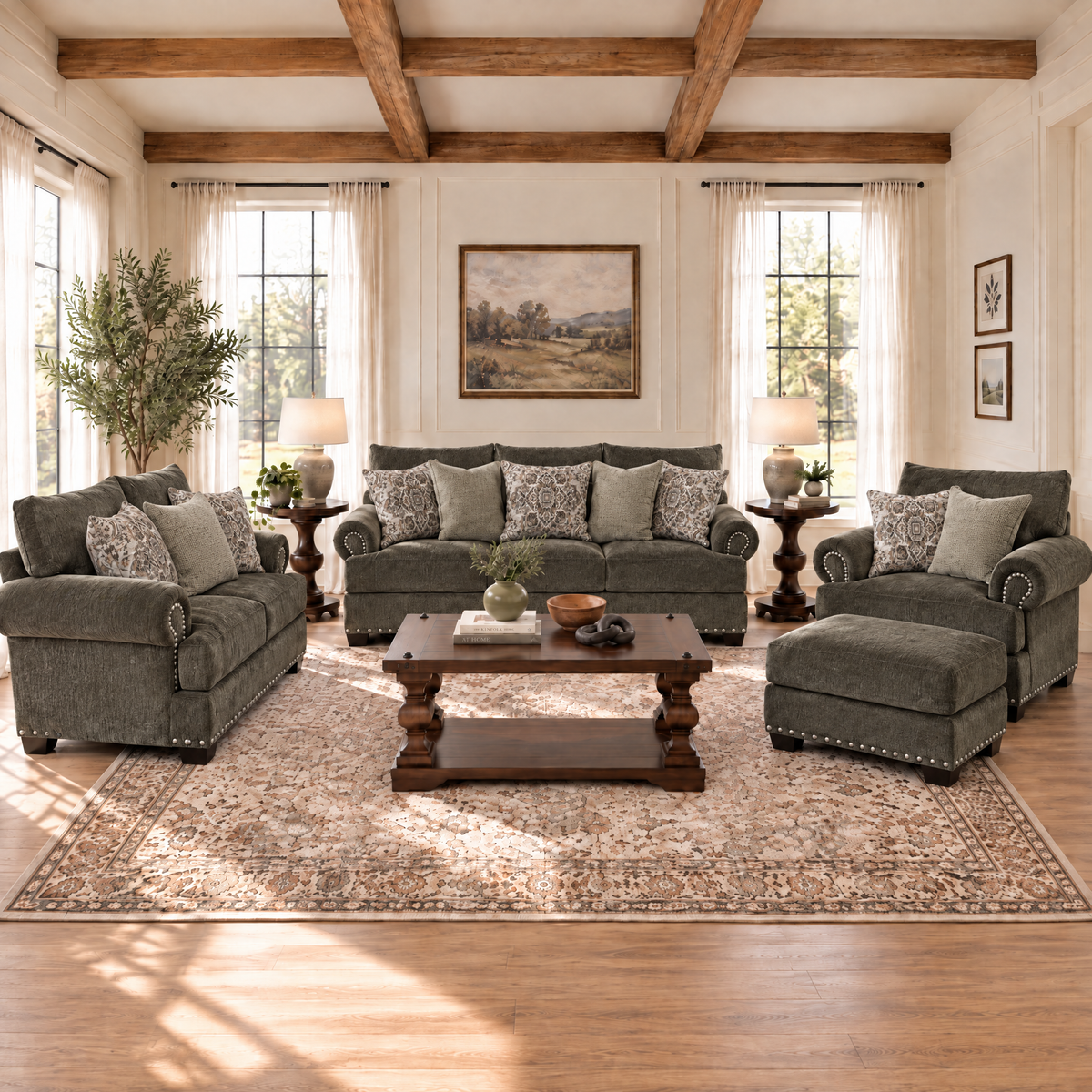 Dark gray upholstered ottoman with rounded arms and low seat cushion