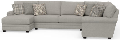 Light gray 3-piece sectional sofa with patterned throw pillows