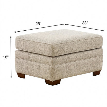Beige upholstered ottoman with hinged top and dark wood legs