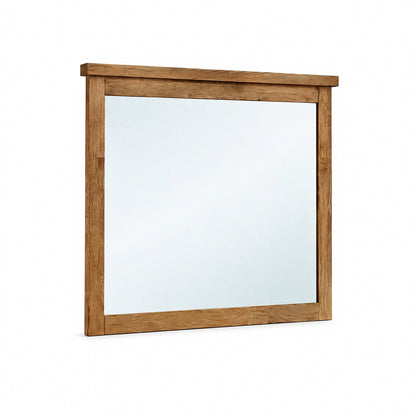 Marley bedroom mirror with a rectangular brown wood frame