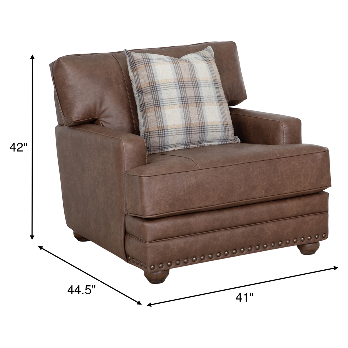 Brown upholstered chair with plaid accent pillow and nailhead trim on arms and base