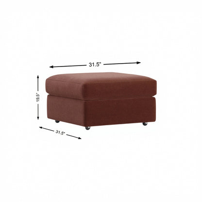 Storage ottoman in merlot fabric, padded hinged lid and tapered legs.