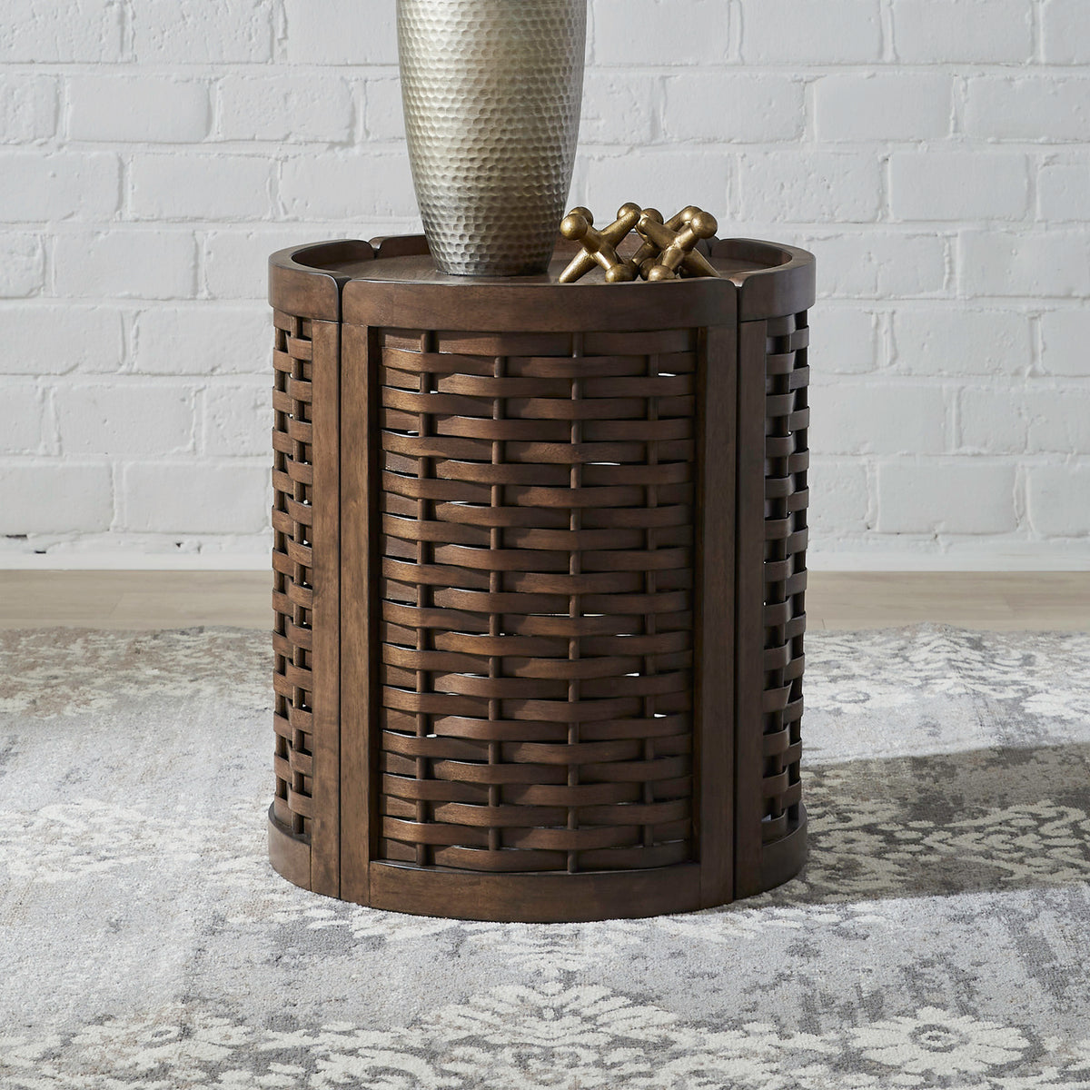 Round woven wood end table with lattice sides and recessed dark wood top