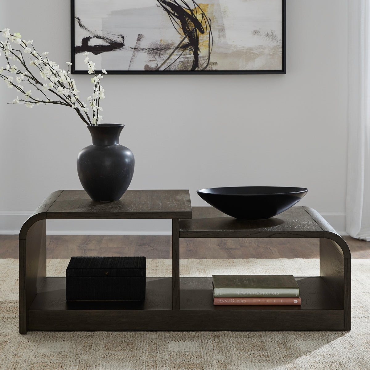 Rectangular dark wood coffee table with open lower shelves