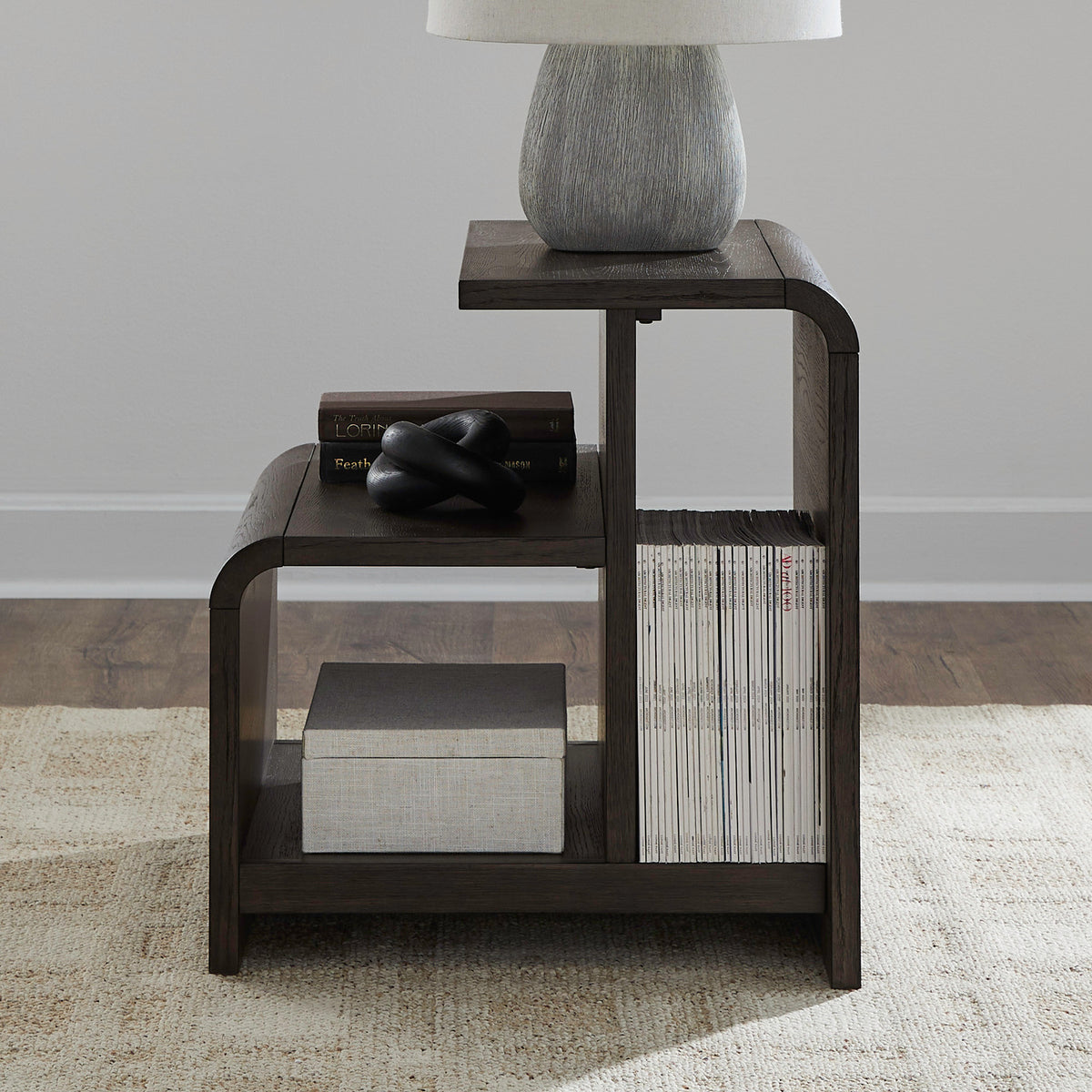 Dark wood end table with top ledge and lower open cubby