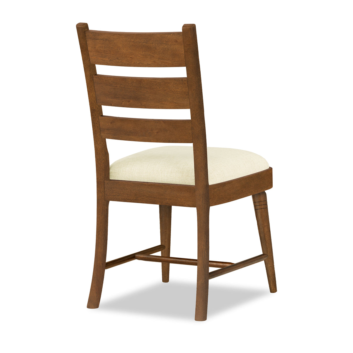 Pinecone ladder-back side chair with cream upholstered seat, angled view.