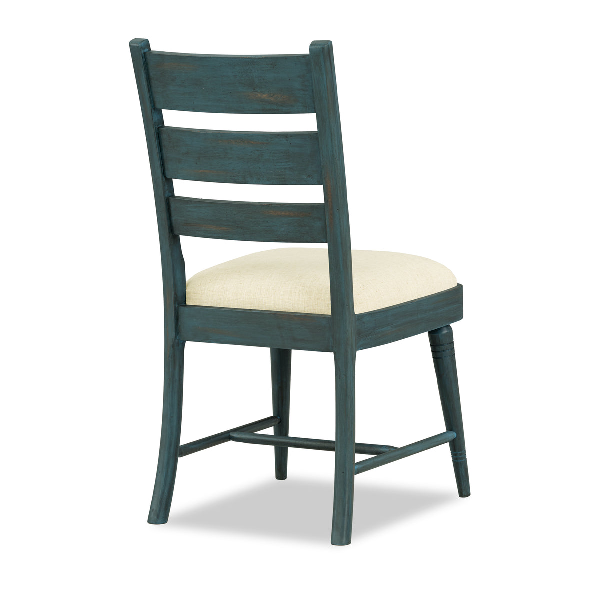 Sea glass ladder-back side chair with cream upholstered seat, angled view.