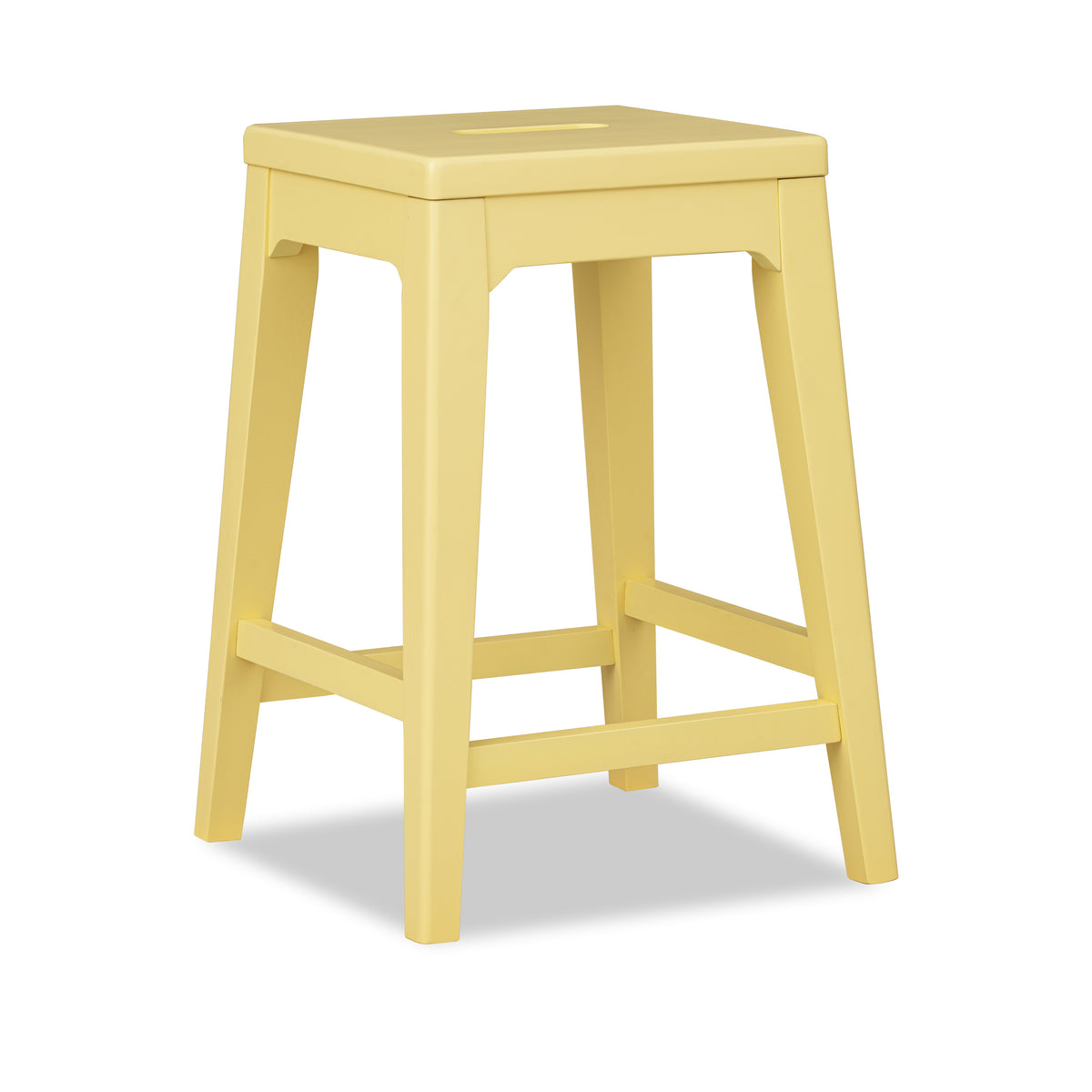 Backless counter stool with light yellow finish, solid legs, and built-in footrest