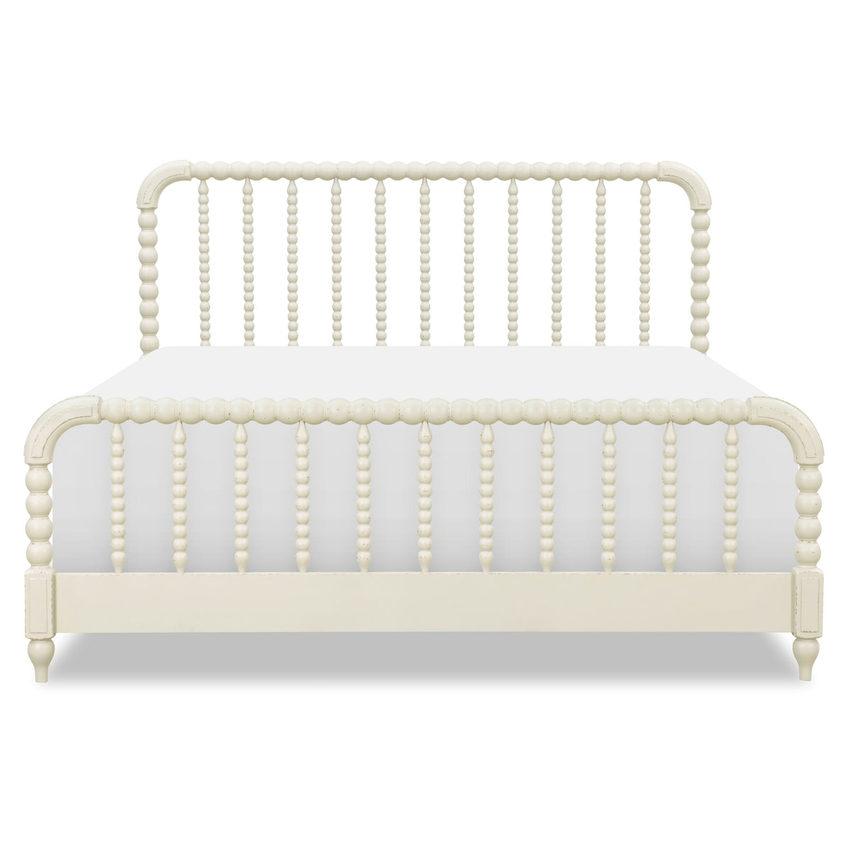 Cream panel bed front with arched headboard, vertical bead detailing, and curved corner posts.