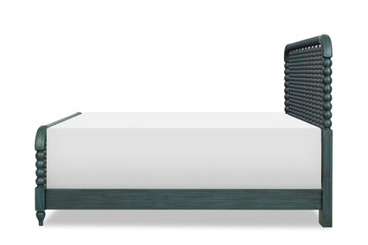Lakehouse panel bed in dark teal, profile view with vertical spindle headboard panel.