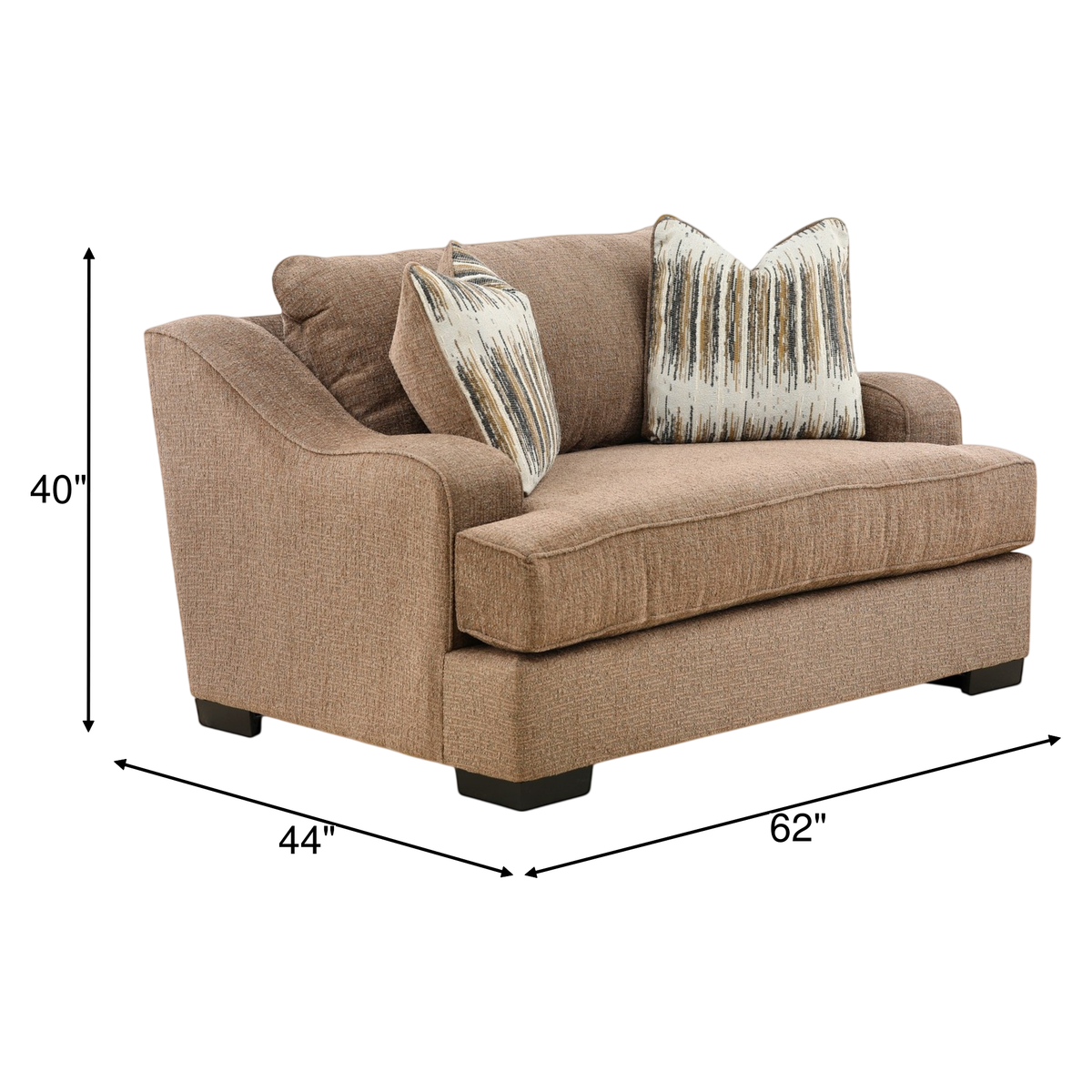 Upholstered lounge chair in tan fabric with two patterned throw pillows