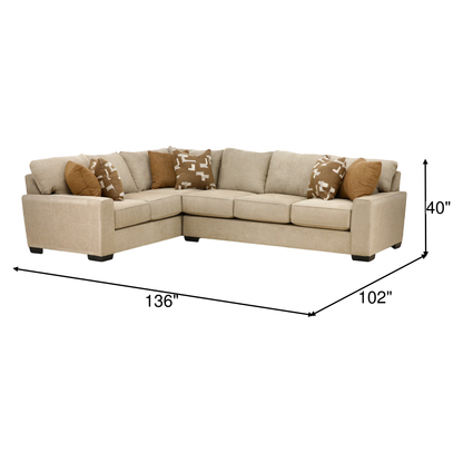 Beige sectional sofa, 136"x102"x40", with chaise and patterned pillows
