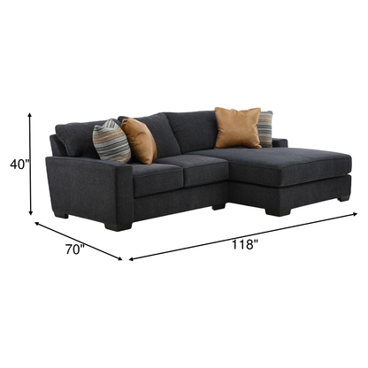 Dark gray sectional sofa with chaise, two throw pillows