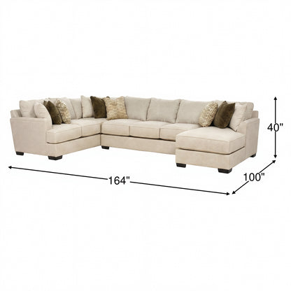 Three-piece sectional sofa with chaise, light beige; dimensions shown 164 in x 100 in