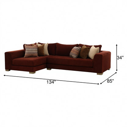 Dark brown L-shaped sectional sofa with five pillows and size measurements shown