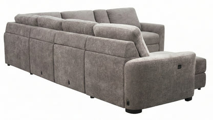 Rear view of gray power sliding seat sectional with chaise and control buttons