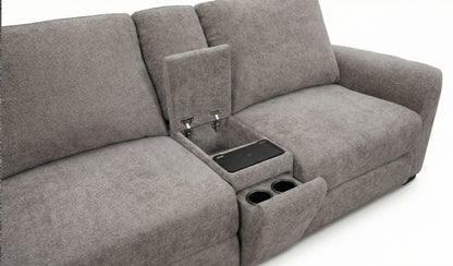 Sectional seat with center console, cup holders, and a charging port