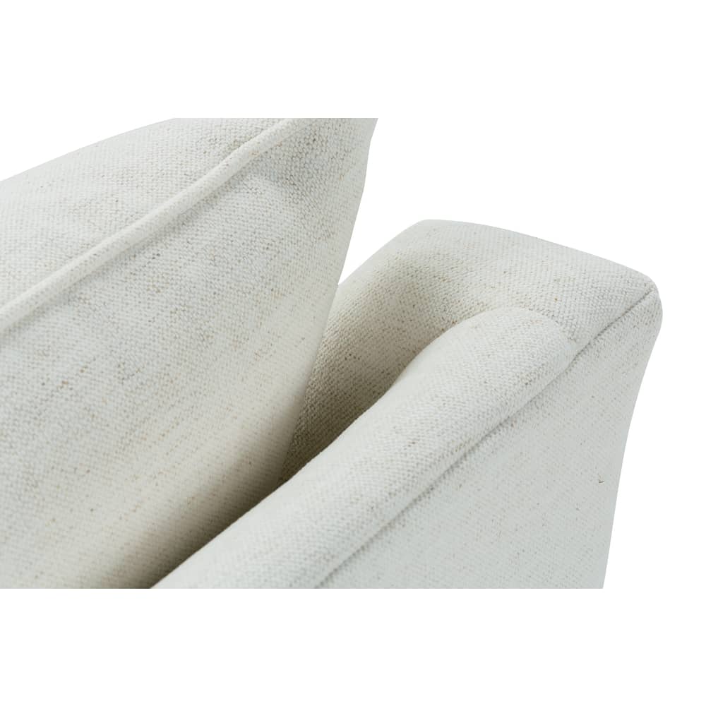 Close-up of light beige swivel glider arm and back cushion upholstery texture