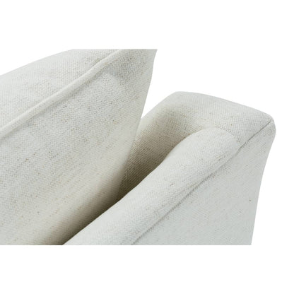 Close-up of light beige swivel glider arm and back cushion upholstery texture