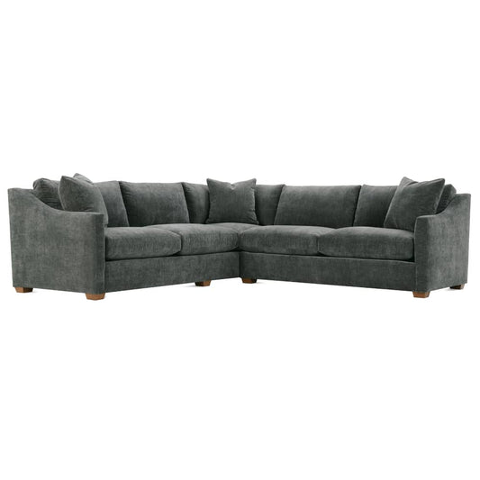 Gray L-shaped sectional sofa with deep seating, tufted back, and multiple throw pillows