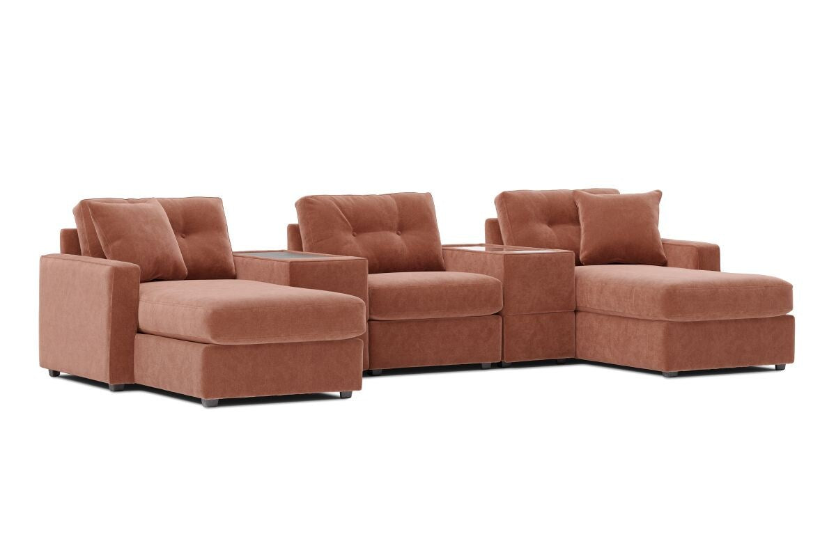 Terracotta modular theater sectional with dual chaise ends and deep tufted cushions.