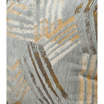 Close-up of blue-gray and gold patterned accent pillow fabric