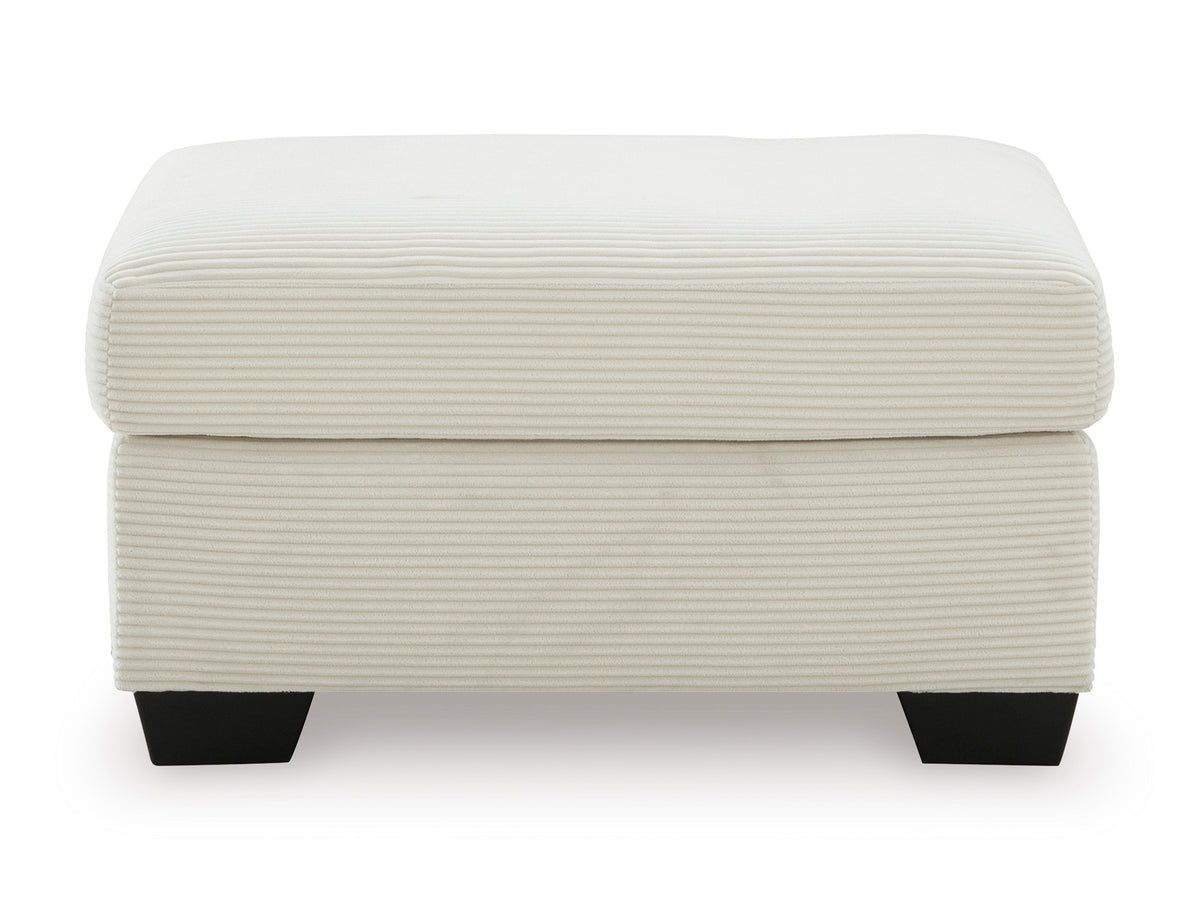 Ivory striped upholstered ottoman with rounded lid and dark block legs